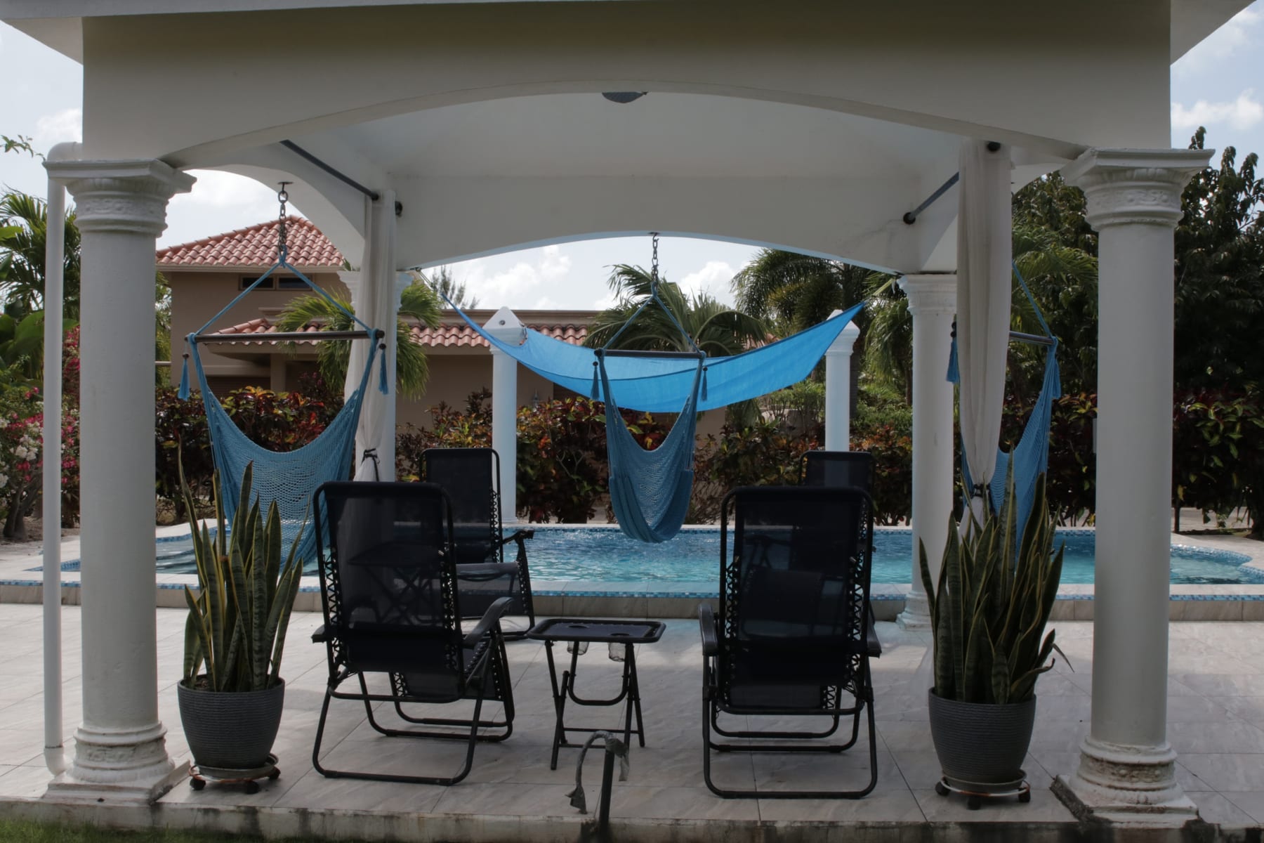 Covered poolside patio at Seaview Drive