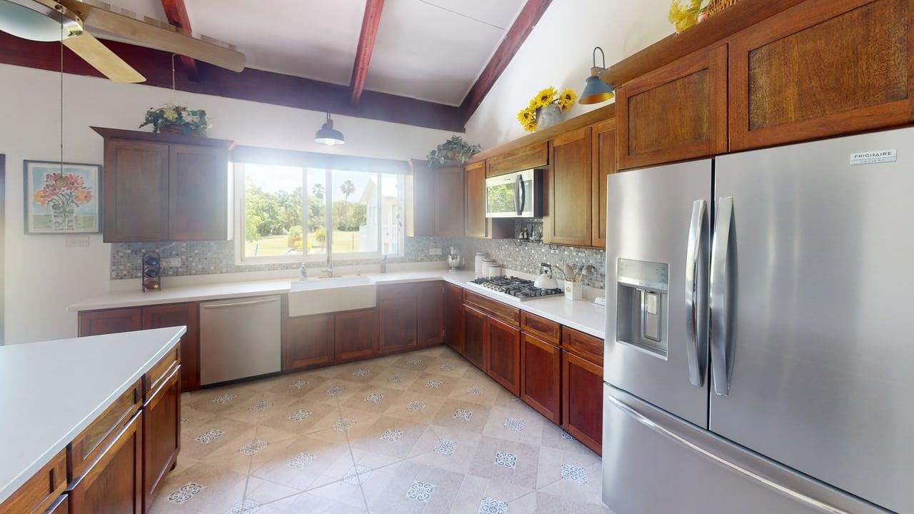 Renovated kitchen with stainless appliances at 16 Tamay Trail