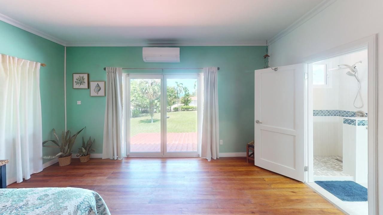 Bedroom opening to the garden at 16 Tamay Trail