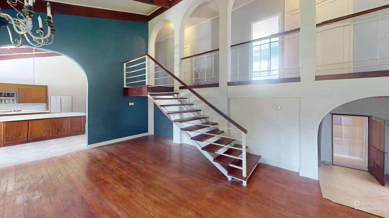 Two-storey entry and staircase at 16 Tamay Trail